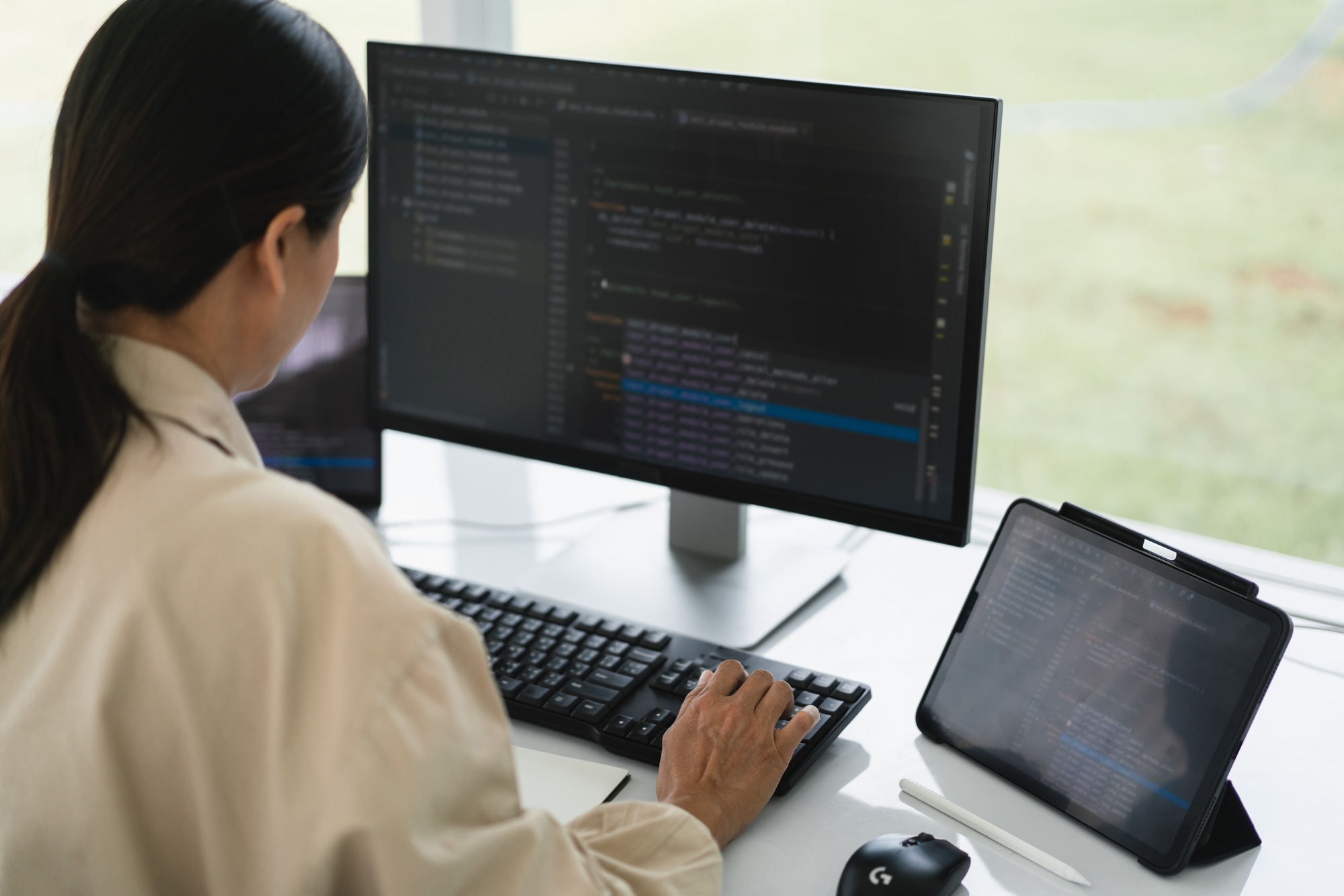 Developer programmer typing code on keyboard for programming to developing web and application